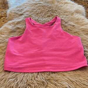 Beyond Yoga tank top. Hot pink color size large. Built in shelf bra. Like new!